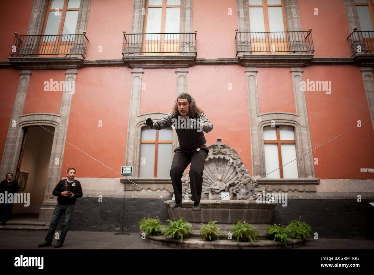 MEXICO CITY, Sept. 9, 2014 -- A clown performs a balancing act during a press conference held to announce the 5th Pantomime Circus and Clown Festival in Mexico City s Museum in Mexico City, capital of Mexico, on Sept. 9, 2014. Pedro Mera) MEXICO-MEXICO CITY-SOCIETY-FESTIVAL e PedroxMera PUBLICATIONxNOTxINxCHN   Mexico City Sept 9 2014 a Clown performs a Balancing ACT during a Press Conference Hero to Announce The 5th Pantomime Circus and Clown Festival in Mexico City S Museum in Mexico City Capital of Mexico ON Sept 9 2014 Pedro Mera Mexico Mexico City Society Festival e  PUBLICATIONxNOTxINxCH Stock Photo