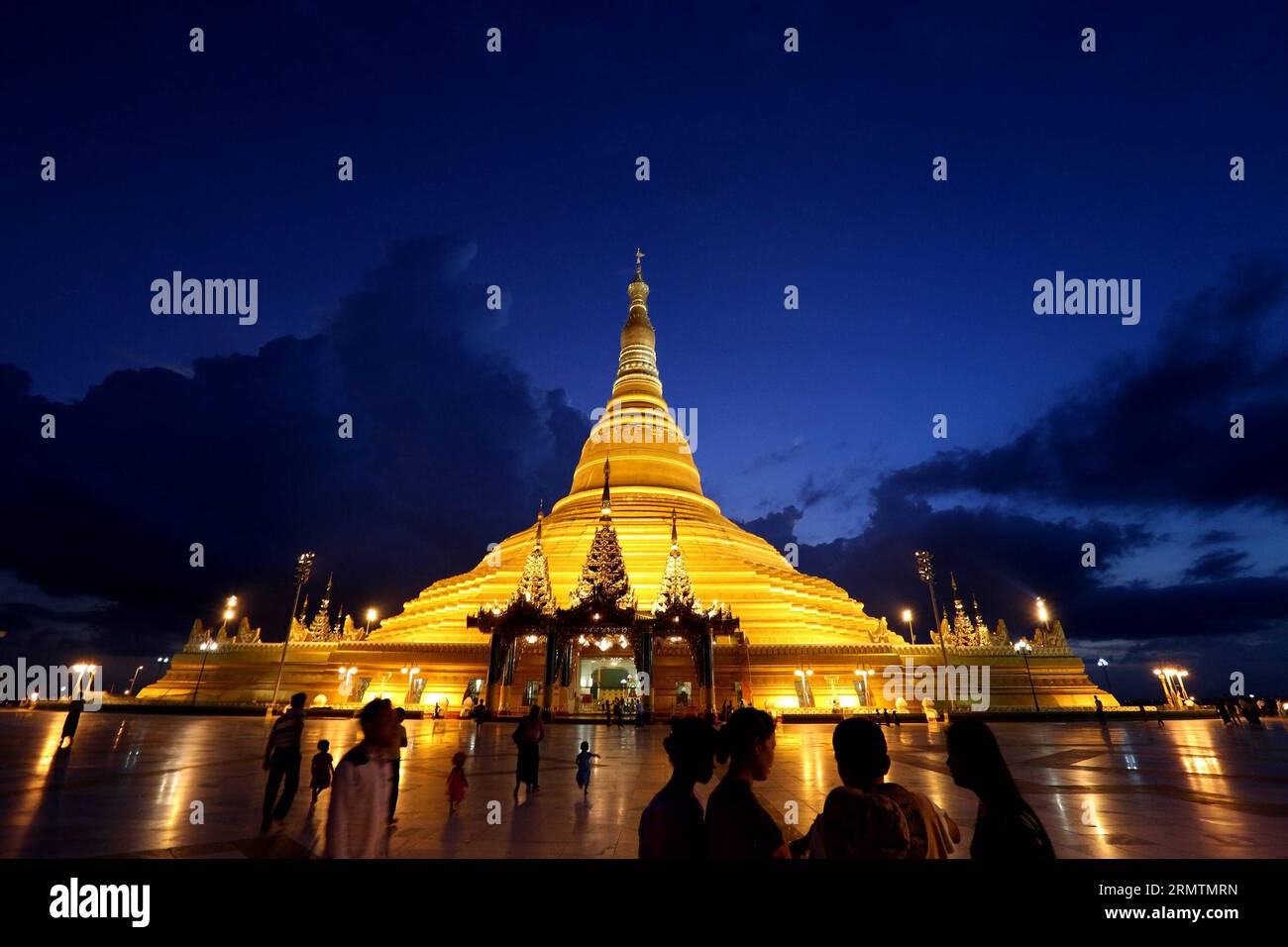 (140912) -- NAY PYI TAW, Sept. 12 -- Photo taken on Sept. 11, 2014 shows a view of the Uppatasanti Pagoda in Nay Pyi Taw, Myanmar. Uppatasanti Pagoda is a prominent landmark in the Burmese capital of Naypyidaw. The pagoda, which houses a Buddha tooth relic from China, is a 325-feet tall replica of Shwedagon Pagoda in Yangon. ) MYANMAR-NAY PYI TAW-UPPATASANTI PAGODA UxAung PUBLICATIONxNOTxINxCHN   Nay Pyi Taw Sept 12 Photo Taken ON Sept 11 2014 Shows a View of The Uppatasanti Pagoda in Nay Pyi Taw Myanmar Uppatasanti Pagoda IS a Prominent Landmark in The Burmese Capital of Naypyidaw The Pagoda Stock Photo