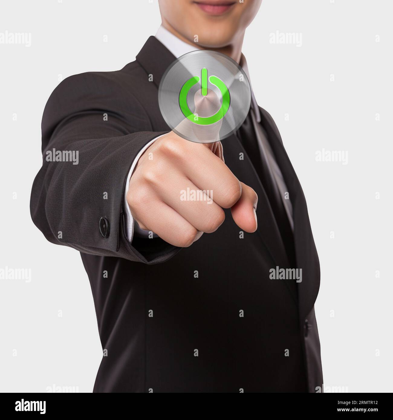 Businessman pressing interface start button. Man pushing turn on button. Stock Photo