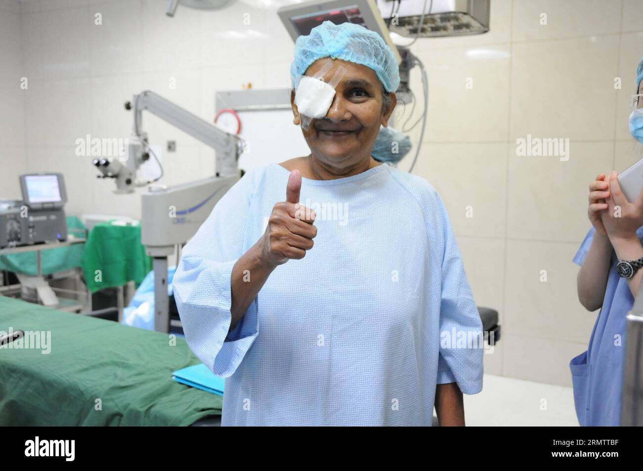 (140919) -- COLOMBO, Sept. 19, 2014 -- A patient thumbs up after a free cataract surgery in Colombo, Sri Lanka, Sept. 11, 2014. Tribute to Love , a China-Sri Lanka free cataract surgery campaign started on Sept. 11 in Colombo, aiming to help 1000 cataract patients. ) (yc) SRI LANKA-COLOMBO-FREE CATARACT SURGERY CAMPAIGN YangxMeiju PUBLICATIONxNOTxINxCHN   Colombo Sept 19 2014 a Patient Thumbs up After a Free Cataract Surgery in Colombo Sri Lanka Sept 11 2014 Tribute to Love a China Sri Lanka Free Cataract Surgery Campaign started ON Sept 11 in Colombo aiming to Help 1000 Cataract Patients  Sri Stock Photo
