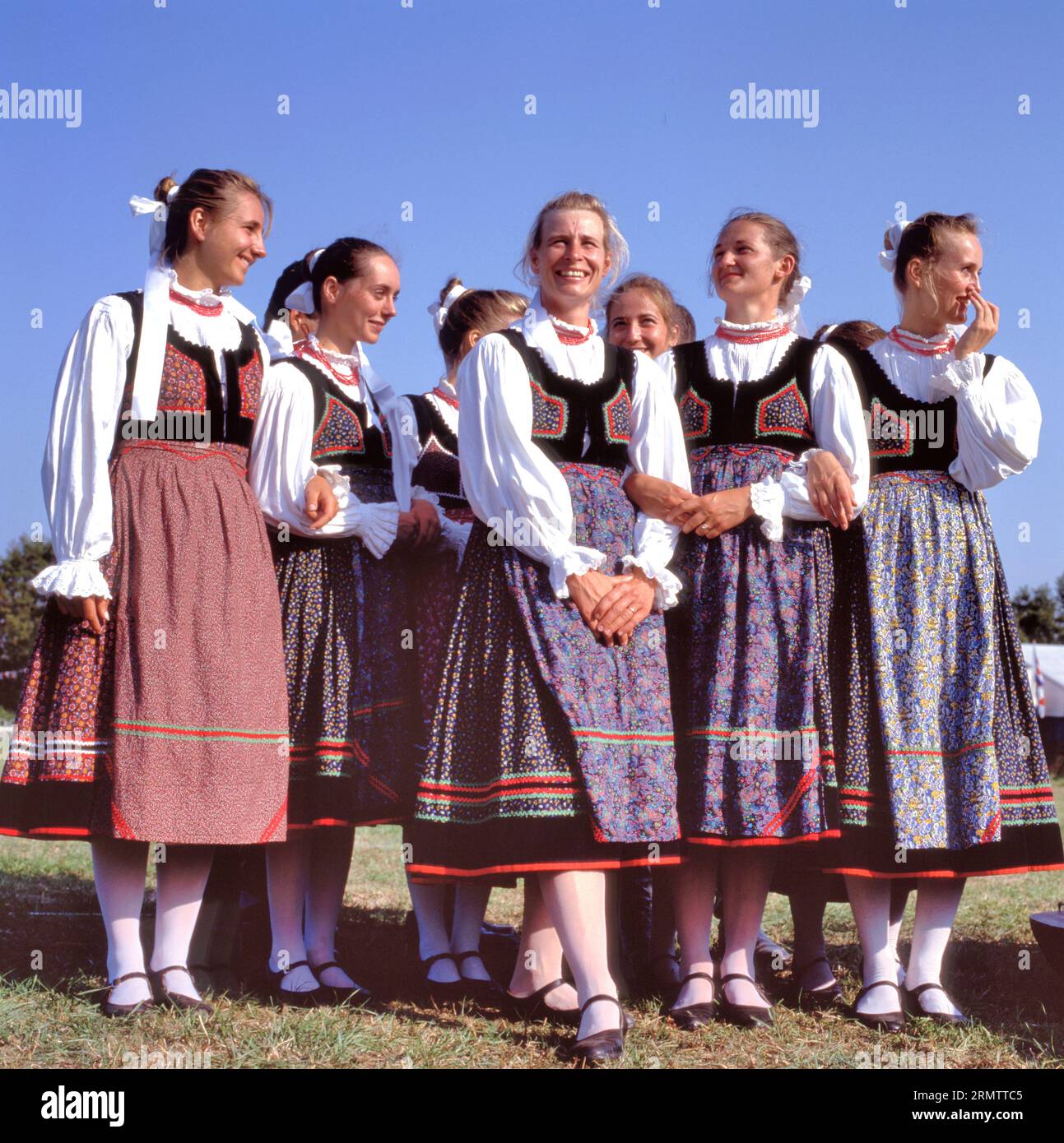 BUDAPEST, HUNGARY- MAY 10, 2012: Women dance group wearing traditional Eastern Europe folk costumes Stock Photo