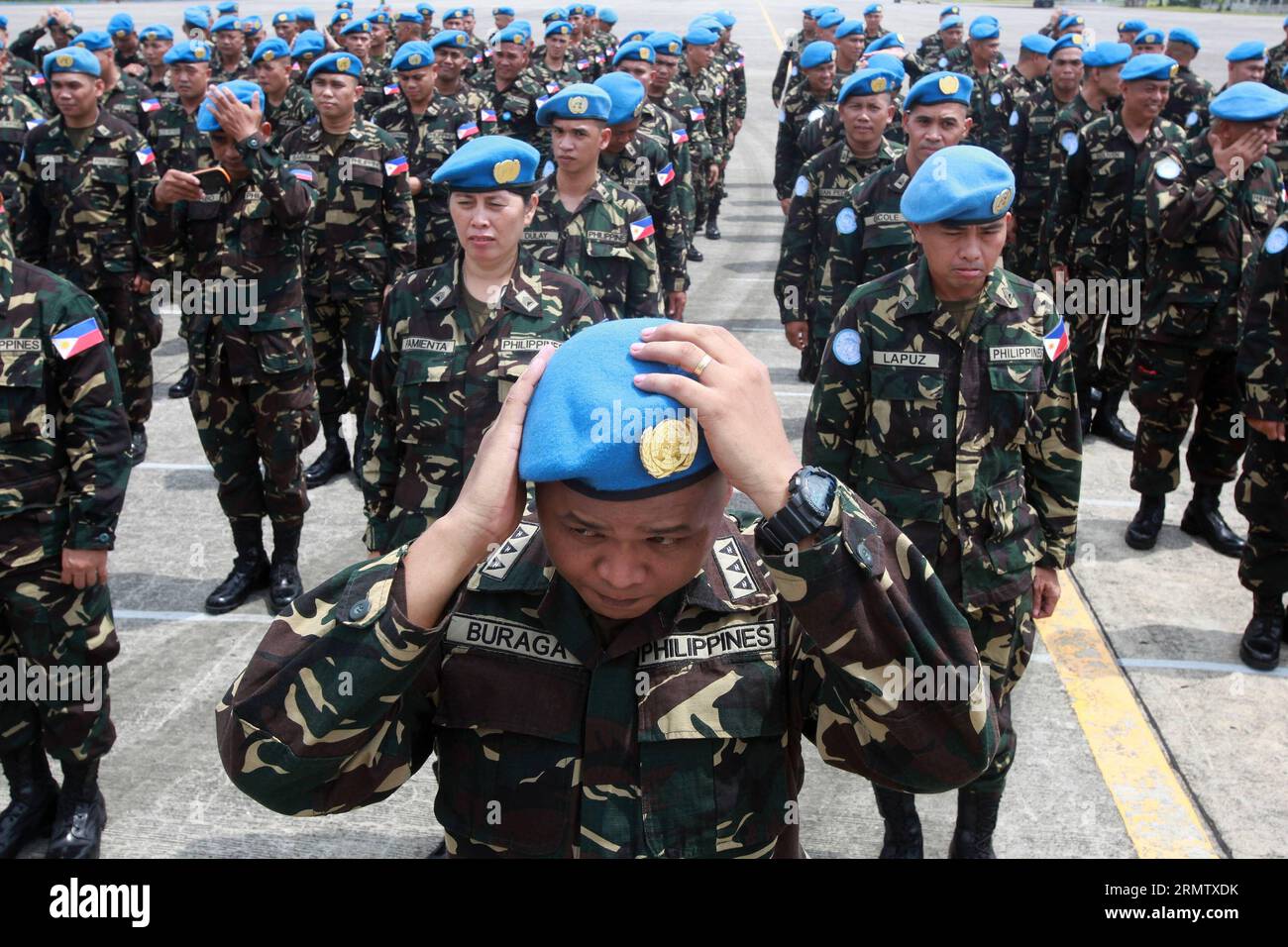 Soldiers of Armed Forces of the Philippines (AFP) attend the send-off ...