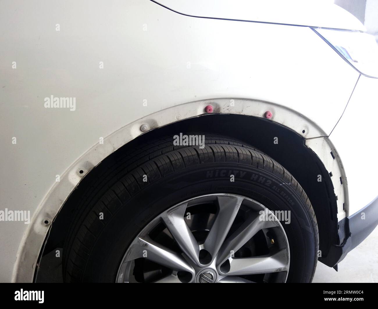 Cairo, Egypt, August 24 2023 close up of black car wheel tyre on a car
