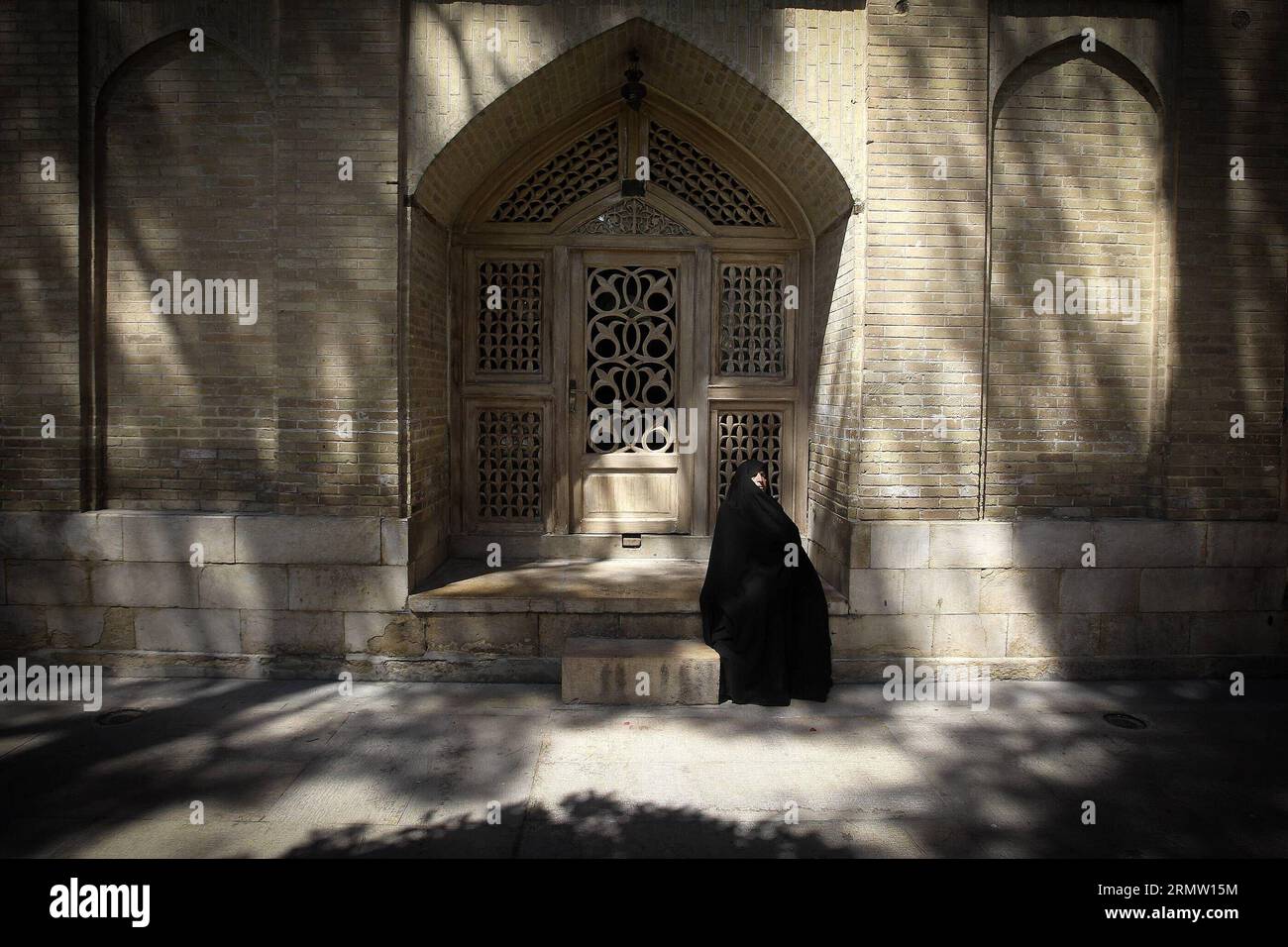 SHIRAZ, Sept. 26, 2014 -- People read poems of Hafez as they sit around the tomb of Persian mystic poet Hafez in southern city of Shiraz on Sept. 26, 2014. Hafez collected poems are regarded as a pinnacle of Persian literature and are to be found in the homes of most people in Iran and Afghanistan. ) (cy) IRAN-SHIRAZ-CULTURE-HAFEZ AhmadxHalabisaz PUBLICATIONxNOTxINxCHN   Shiraz Sept 26 2014 Celebrities Read Poems of Hafez As They Sit Around The Tomb of Persian Mystic Poet Hafez in Southern City of Shiraz ON Sept 26 2014 Hafez collected Poems are regarded As a Pinnacle of Persian Literature and Stock Photo