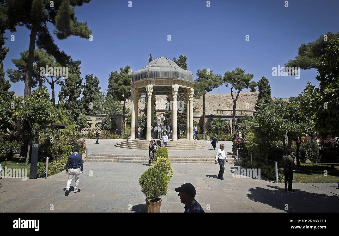 SHIRAZ, Sept. 26, 2014 -- People read poems of Hafez as they sit around the tomb of Persian mystic poet Hafez in southern city of Shiraz on Sept. 26, 2014. Hafez collected poems are regarded as a pinnacle of Persian literature and are to be found in the homes of most people in Iran and Afghanistan. ) (cy) IRAN-SHIRAZ-CULTURE-HAFEZ AhmadxHalabisaz PUBLICATIONxNOTxINxCHN   Shiraz Sept 26 2014 Celebrities Read Poems of Hafez As They Sit Around The Tomb of Persian Mystic Poet Hafez in Southern City of Shiraz ON Sept 26 2014 Hafez collected Poems are regarded As a Pinnacle of Persian Literature and Stock Photo