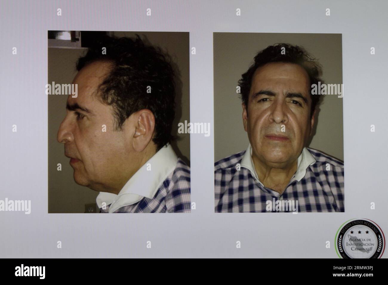 mexico-city-oct-1-2014-people-watch-an-image-projected-on-a