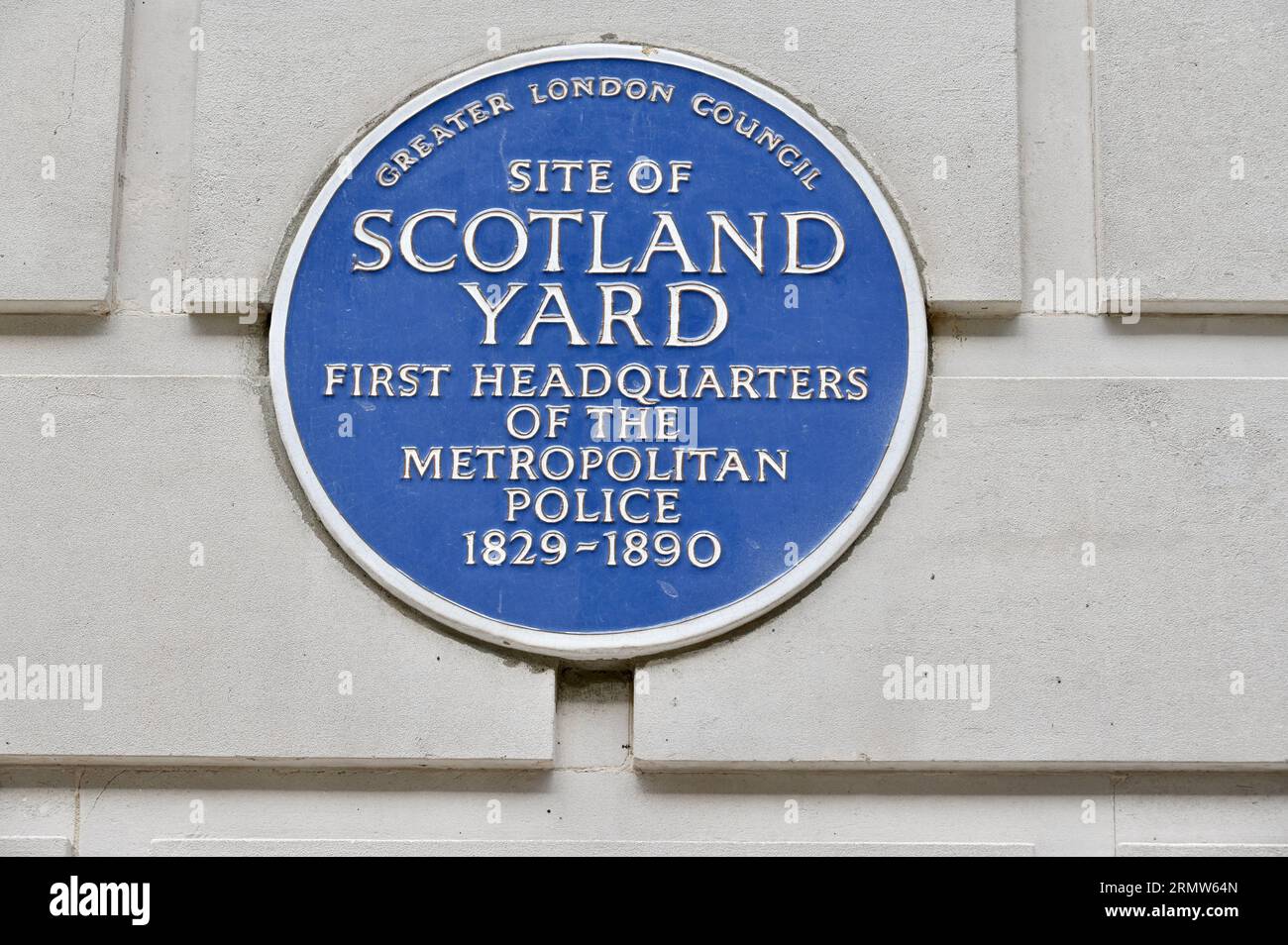 Blue Plaque marking the site of Scotland Yard. The first Headquarters of the Metropolitan Police, Whitehall, London, UK Stock Photo