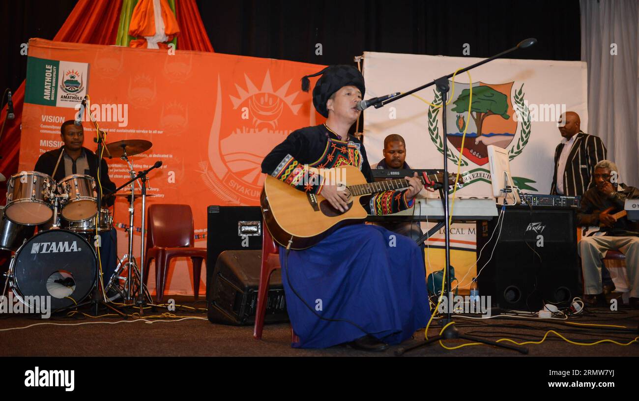 Jike Qubu, a student and representive of Jidi Majia who is a Chinese poet and winner of the 2014 Mkiva Humanitarian Awards, peforms during the awarding ceremony at Walter Sisulu University Butterworth Campus in Eastern Cape, South Africa, on Oct. 10, 2014. The Mkiva Humanitarian Awards celebrates the efforts and successes of African and International leaders who have made an impact on local or international communities. This year s recipients include: Jidi Majia of China, Saeb Erekat of Palestine, Queen Best Kemigisa of Uganda and Rebecca Malope, Mzimasi Mnguni and Mthetheleli NgumbelaThe of S Stock Photo