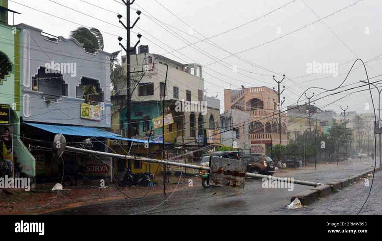 Power cables are seen snapped as the severe cyclone storm Hudhud swept through India s southern city of Visakhapatnam on Oct. 12, 2014. At least six people were killed on Sunday because of the cyclone, said officials.)(zhf) INDIA-VISHAKHAPATNAM-CYCLONE Stringer PUBLICATIONxNOTxINxCHN   Power cables are Lakes snapped As The severe Cyclone Storm  Swept Through India S Southern City of  ON OCT 12 2014 AT least Six Celebrities Were KILLED ON Sunday because of The Cyclone Said Officials  India  Cyclone Stringer PUBLICATIONxNOTxINxCHN Stock Photo