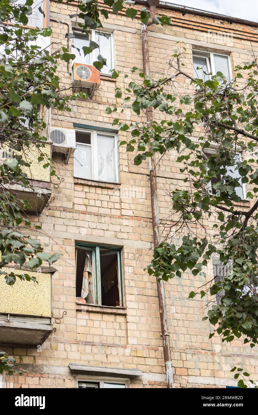 Missile attack in Kyiv, Ukraine, august 2023. Broken windows after explosion. House damaged by blast wave. War in Ukraine. Stock Photo