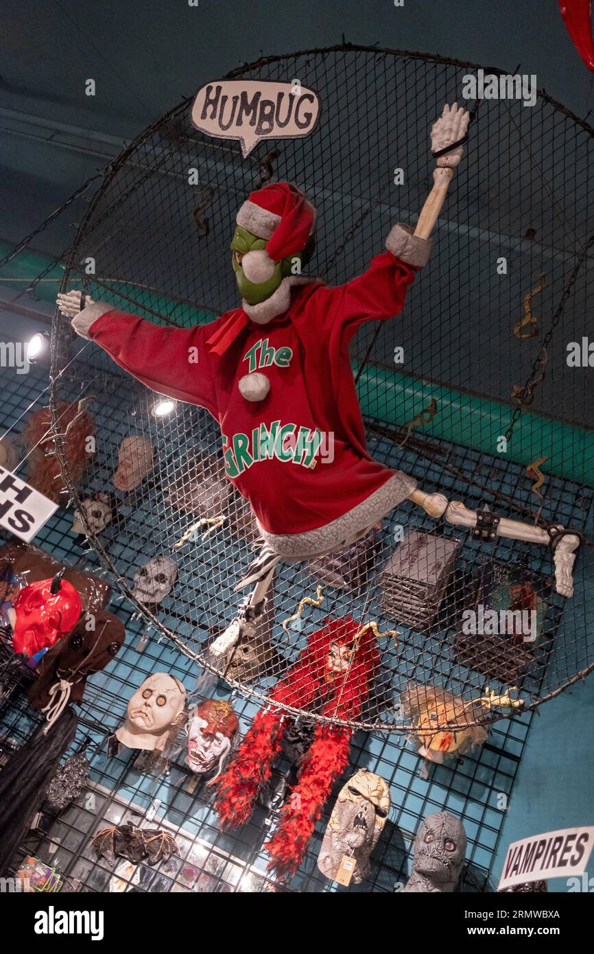 A ceiling display of the Grinch, a Dr. Seuss character for sale at the