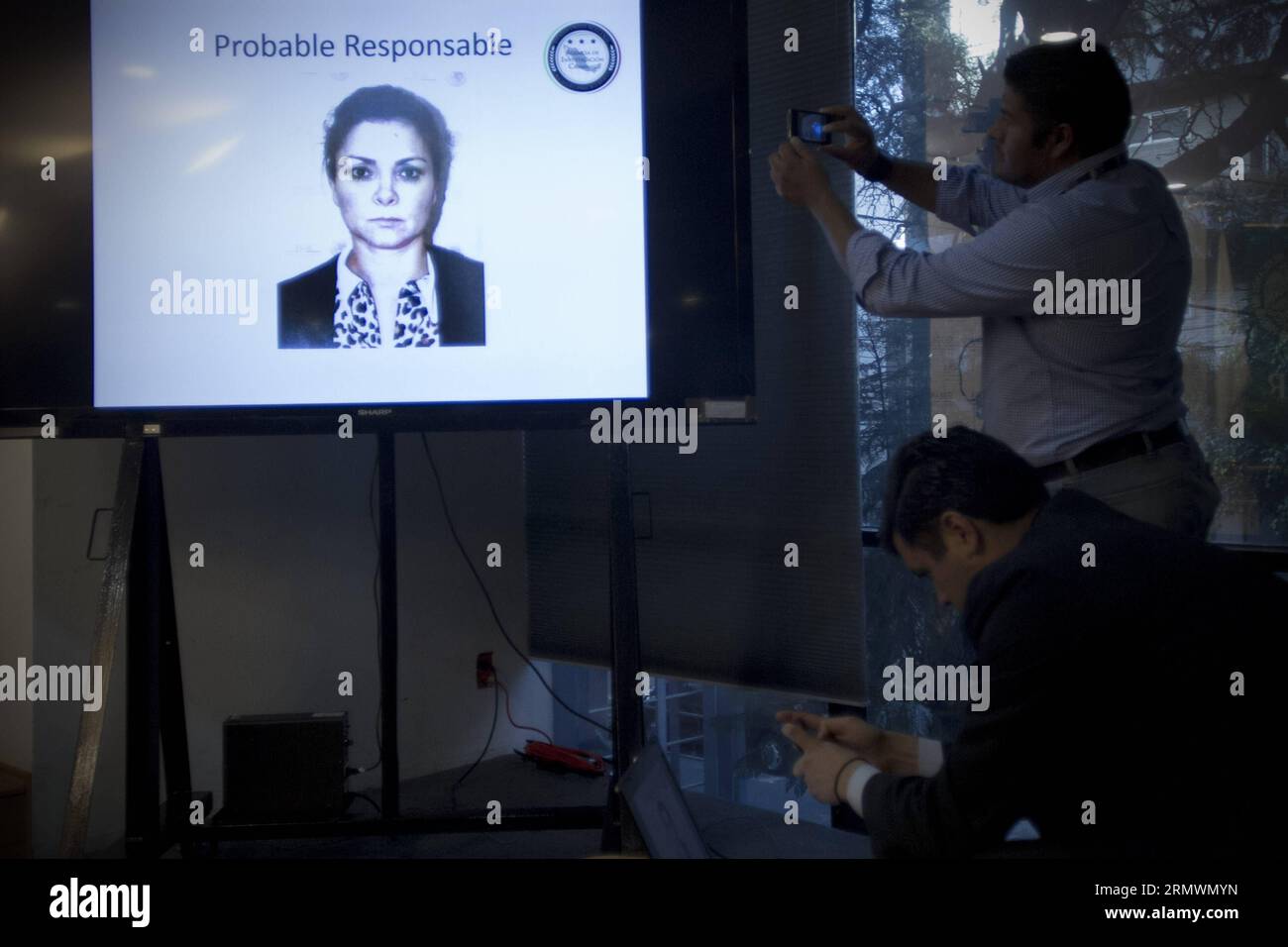 (141105) -- MEXICO CITY, Nov. 4, 2014 -- Photo taken on Nov. 4, 2014 shows a photo of Maria de los Angeles Pineda, wife of the ex-mayor of Iguala Jose Luis Abarca, during the press conference on the detention of them in Mexico City, capital of Mexico. Mexican authorities Tuesday captured a fugitive former mayor wanted for his role in the abduction of 43 students in late September. The ex-mayor of Iguala, in Mexico s southern state of Guerrero, Jose Luis Abarca and his wife Maria de los Angeles Pineda were captured in a pre-dawn raid on the house where they were staying in Mexico City s populou Stock Photo
