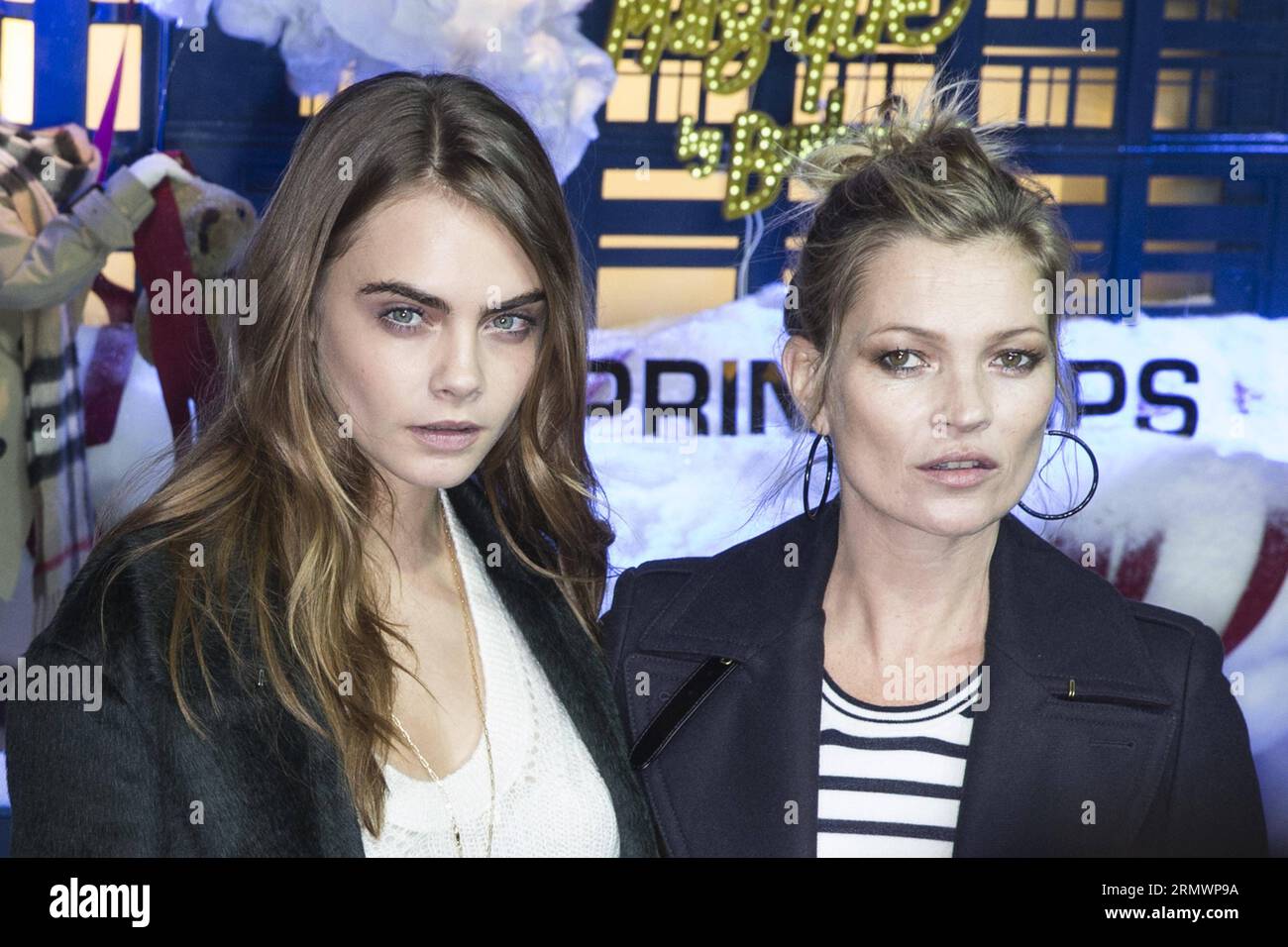 141107-paris-british-models-cara-delevingne-l-and-kate-moss