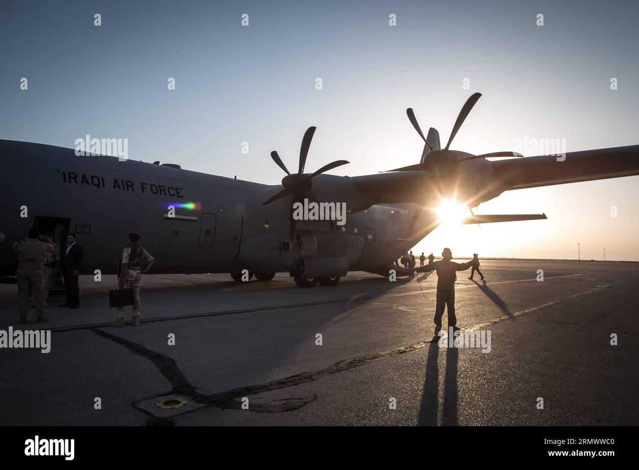 A C-130 transport plane arrives at Ein al-Asad Air Base in west Iraq s Anbar Province Nov. 11, 2014. US military experts arrived at Ein al-Asad Air Base on Nov.10 to help train and support Iraqi forces. ) IRAQ-EIN AL-ASAD AIR BASE-US TRAINERS ChenxXu PUBLICATIONxNOTxINxCHN   a C 130 Transportation Plane arrives AT a Al Asad Air Base in WEST Iraq S Anbar Province Nov 11 2014 U.S. Military Experts arrived AT a Al Asad Air Base ON Nov 10 to Help Train and Support Iraqi Forces Iraq a Al Asad Air Base U.S. Trainers  PUBLICATIONxNOTxINxCHN Stock Photo