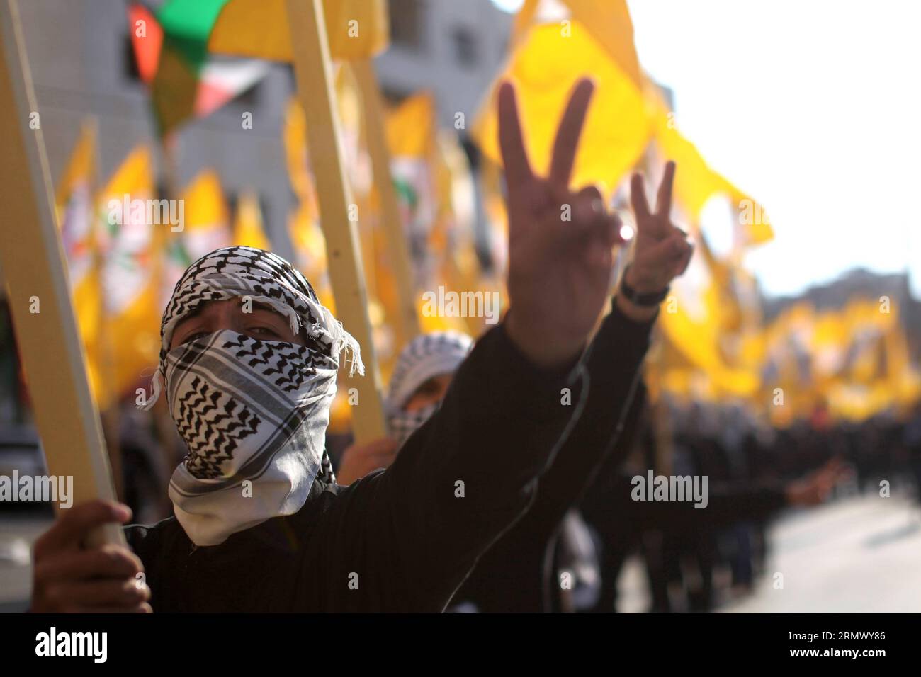 (141115) -- BETHLEHEM, Nov. 15, 2014 -- Palestinian Fatah supporters take part in a rally to mark the 26th anniversary of Palestinian Independence Declaration Day in the West Bank city of Bethlehem, Nov. 15, 2014. Late Palestinian leader Yasser Arafat made the declaration of independence when the Palestinian National Council (PNC), or the Palestinian Parliament in exile, was held in Algeria on Nov. 15, 1988. ) MIDEAST-BETHLEHEM-PALESTINE-INDEPENDENCE DECLARATION DAY-ANNIVERSARY LuayxSababa PUBLICATIONxNOTxINxCHN   Bethlehem Nov 15 2014 PALESTINIAN Fatah Supporters Take Part in a Rally to Mark Stock Photo
