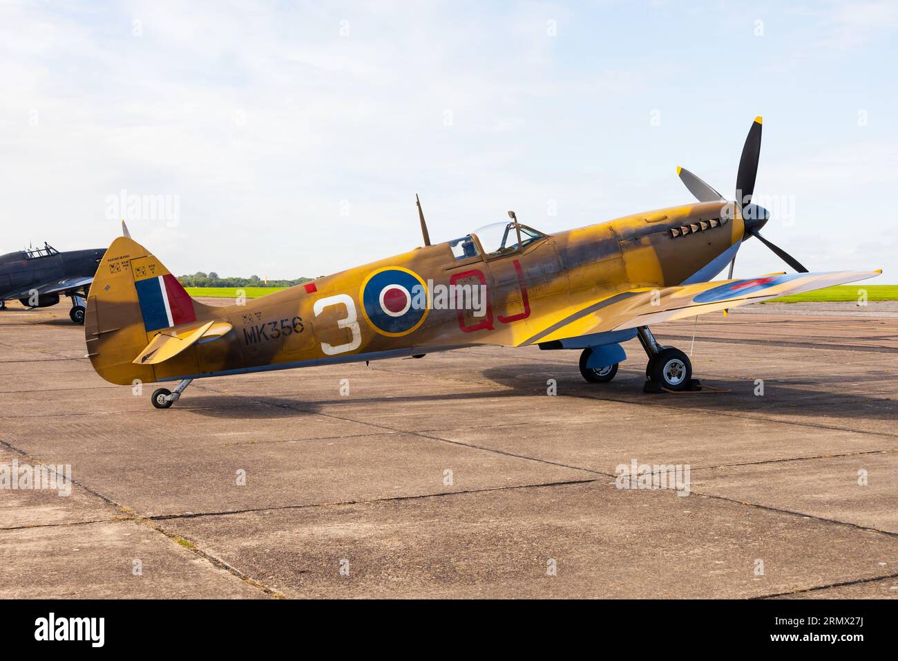 WW2 fighter, Supermarine, Spitfire Mk1Xe, Low level, MK356 of the Battle of Britain Memorial Flight, RAF. On the apron at RAF Syerston, England. The a Stock Photo
