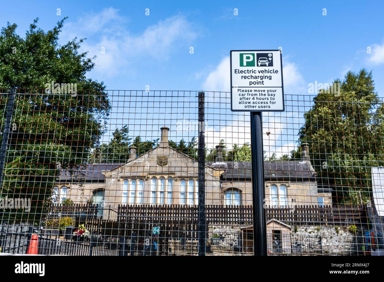 Electric vehicle charging station in a rural village in Northumberland Stock Photo