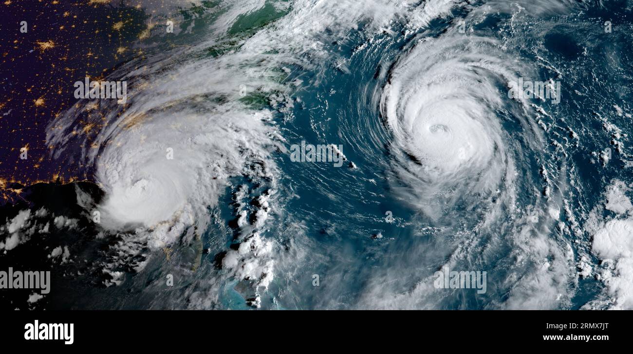 Hurricane Idalia (left) as it is making landfall on Wednesday morning, August 30, 2023, near Keaton Beach, Florida, while Hurricane Franklin (left) churns in the Atlantic. (USA) Stock Photo