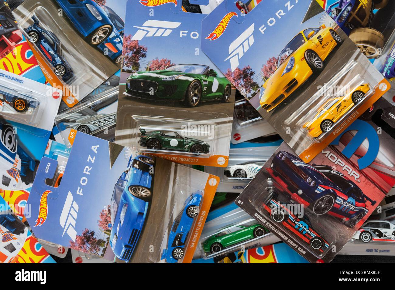 Doha, Qatar - August 17, 2023: Assortment of Hot Wheels die cast carded car model for Hot Wheels series. Hot Wheels is a scale die-cast toy cars by Am Stock Photo