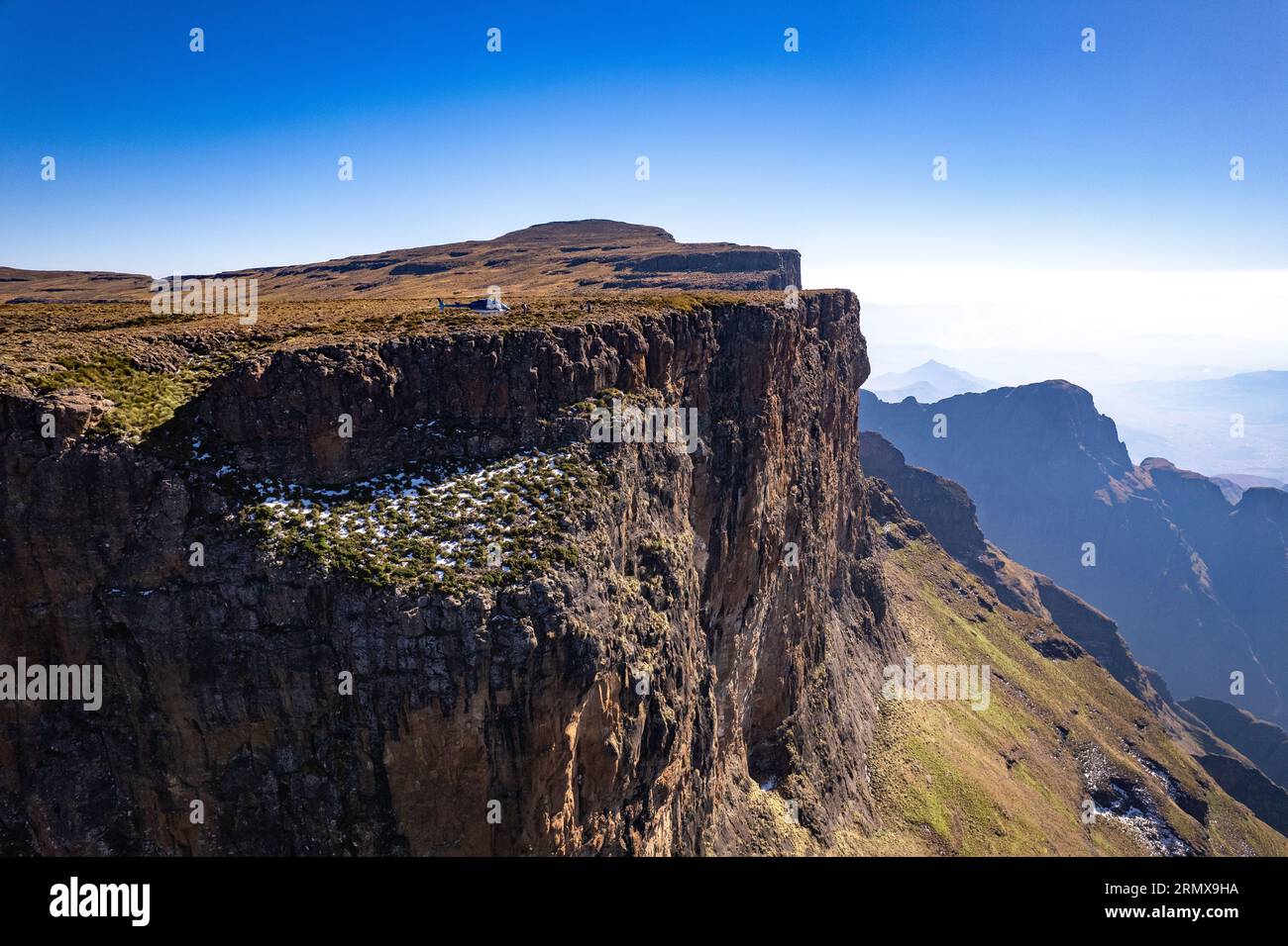 Aerial view of Cathedral Peak in Drakensberg mountains, at the Lesotho ...