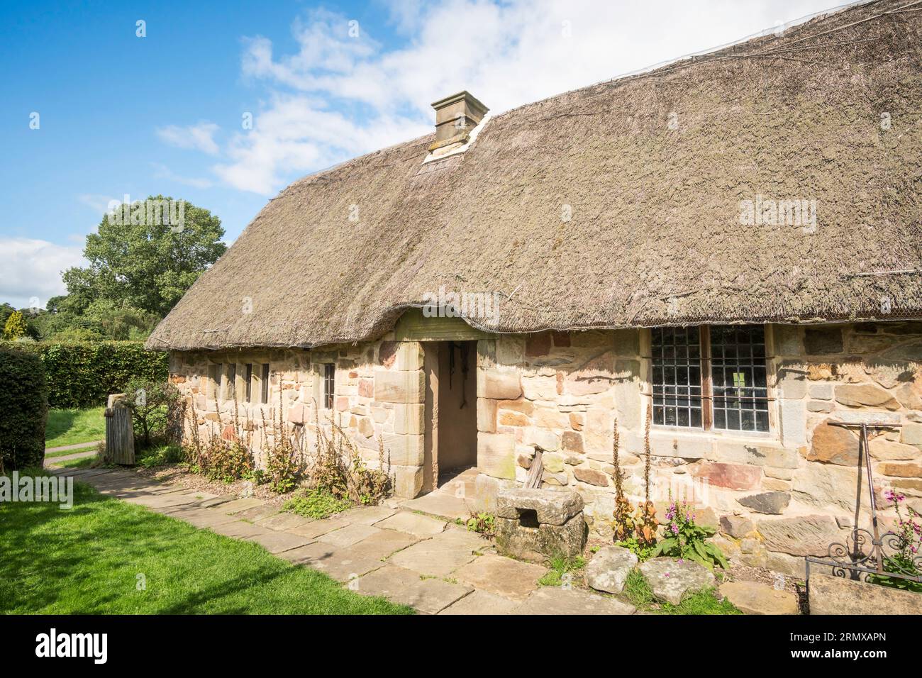 The reconstructed Stang End Long House or Cruck Cottage, Ryedale folk museum, England, UK Stock Photo
