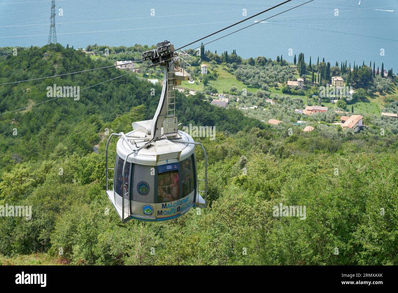 Funivia cable car gondola on the way from Malcesine on Lake Garda to the top of Monte Baldo mountain in Italy Stock Photo