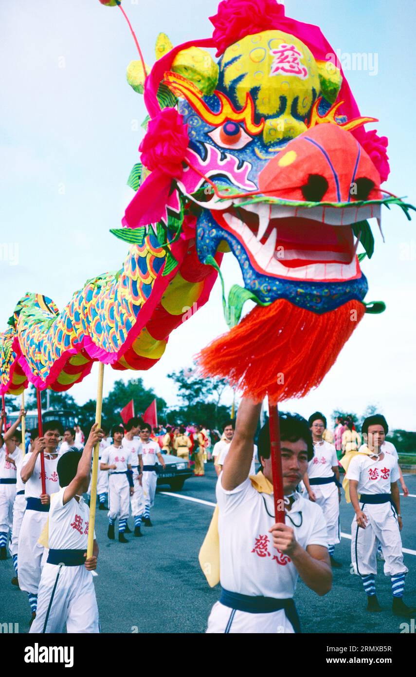 Singapore. Chinese New Year carnival. Dragon procession. Stock Photo
