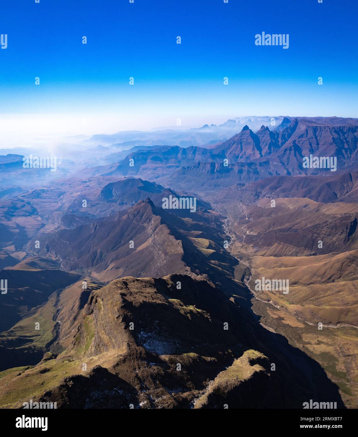 Aerial view of Cathedral Peak in Drakensberg mountains, at the Lesotho ...