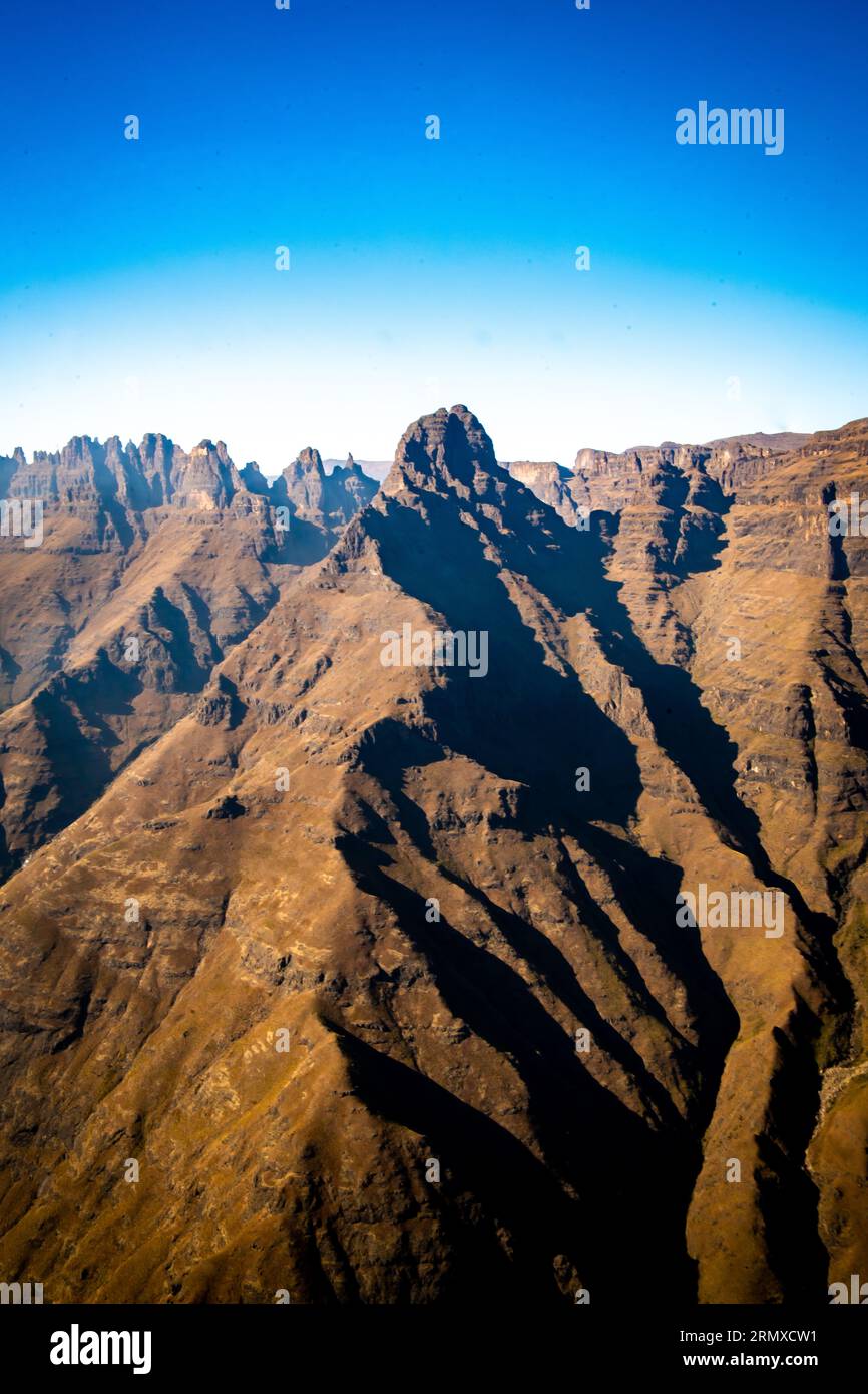Aerial view of Cathedral Peak in Drakensberg mountains, at the Lesotho ...