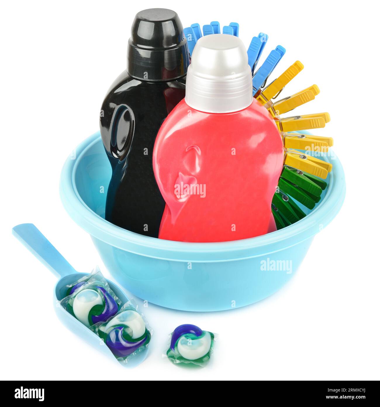 Chemicals for washing and cleaning, a basin and clothespins isolated on a white background. Stock Photo