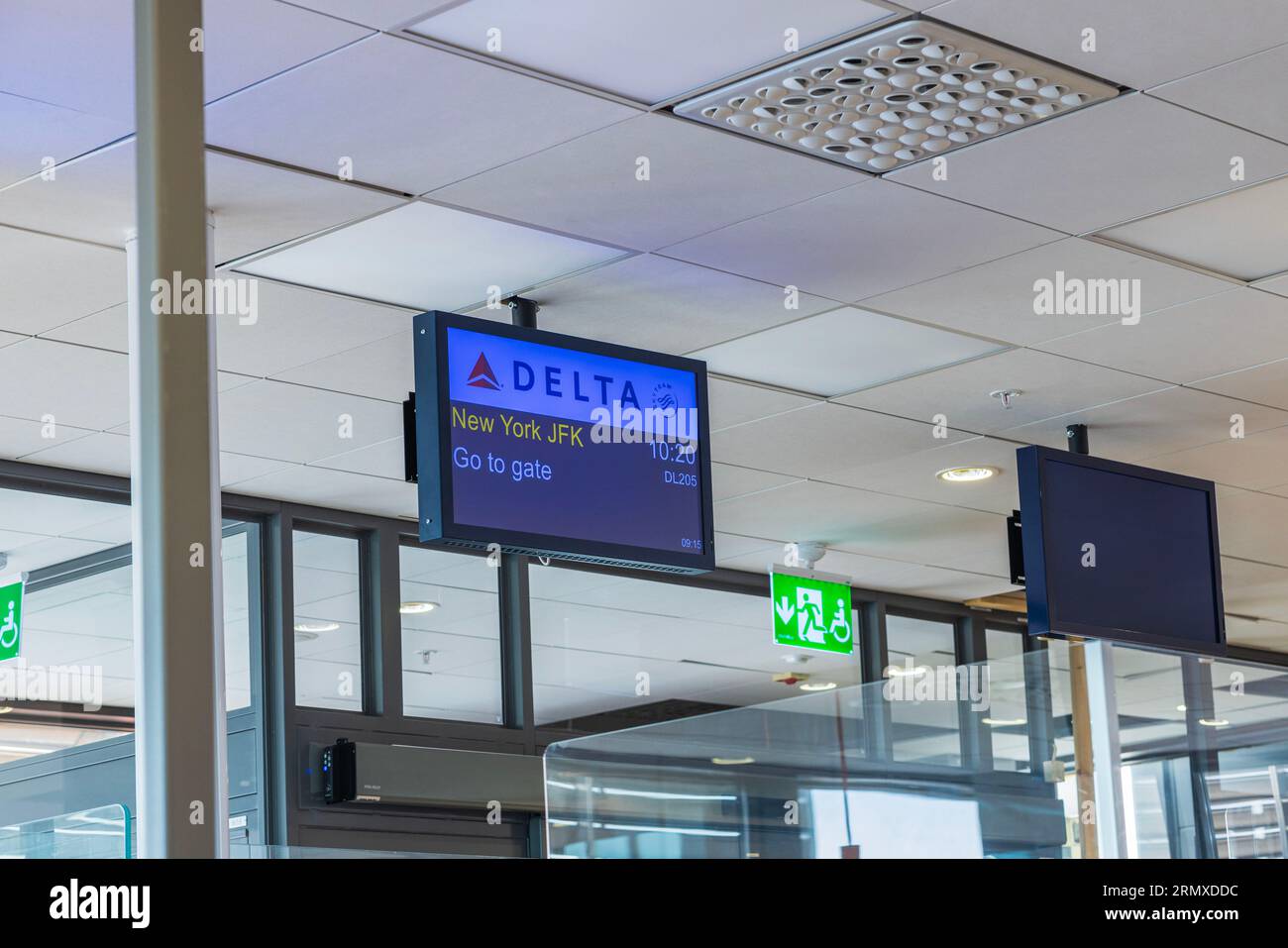 Сlose-up view of Delta airline information display at airport gate with departure information for New York USA. Stock Photo
