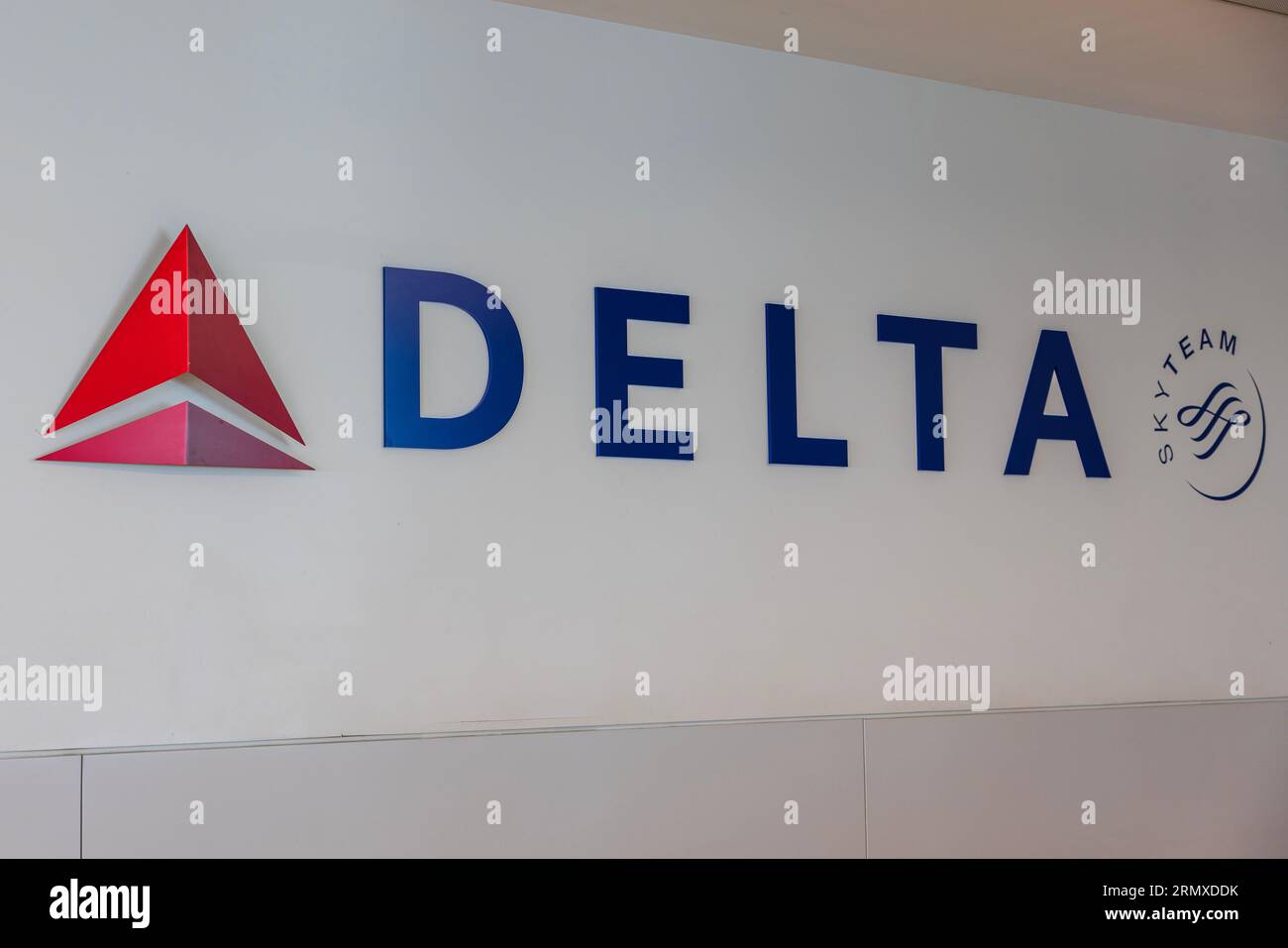 Beautiful view of Delta logo on white wall background. USA. NY. Stock Photo