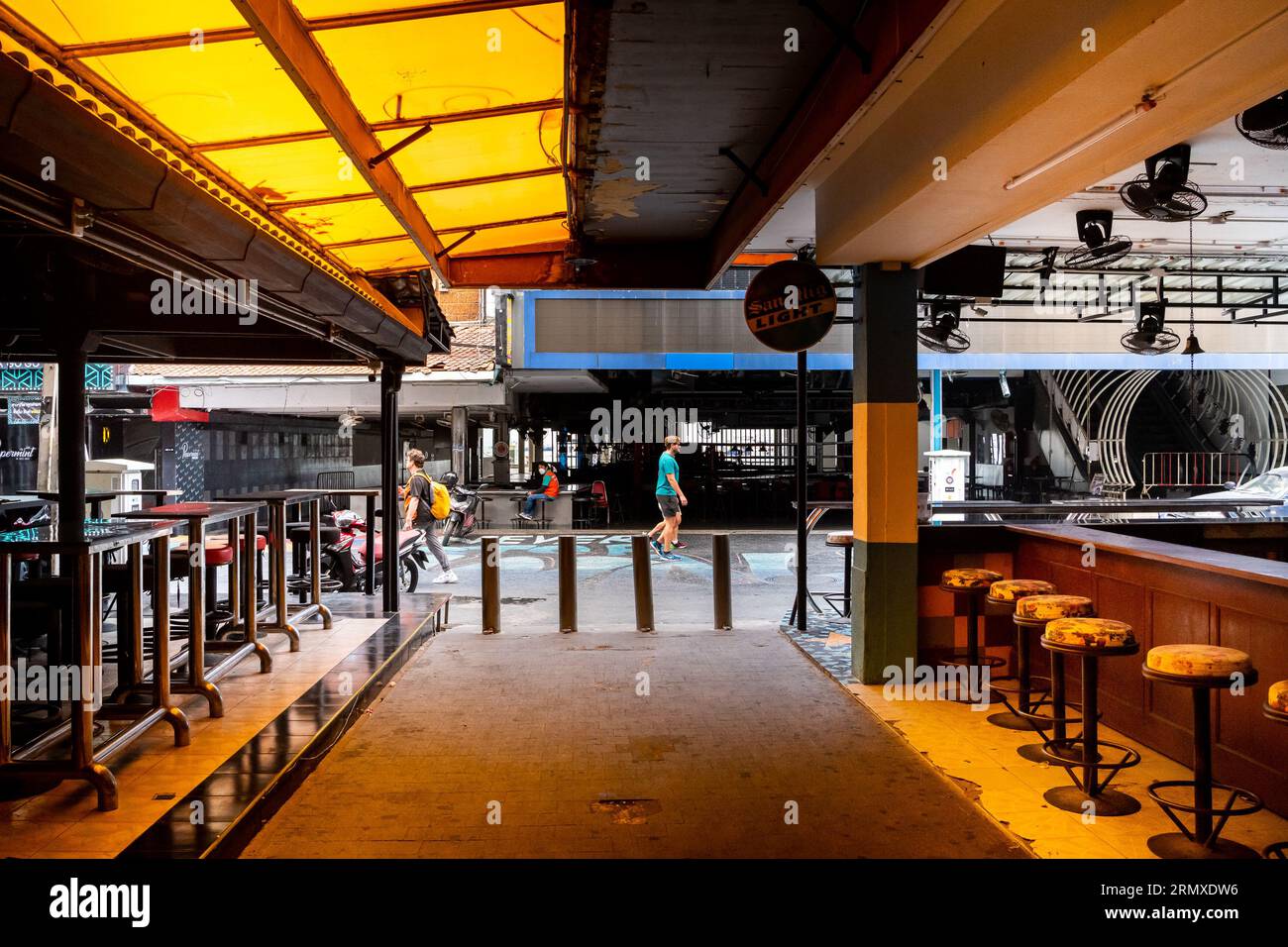 Looking through the some empty beer bars on to Walking Street, Pattaya