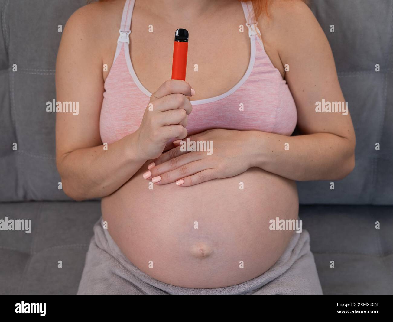 vape while pregnant There is minimal data regarding the safety of vapes in pregnancy, but there  are several theoretical reasons why it is not recommended you vape during  pregnancy: Nicotine exposure: Vaping products can contain