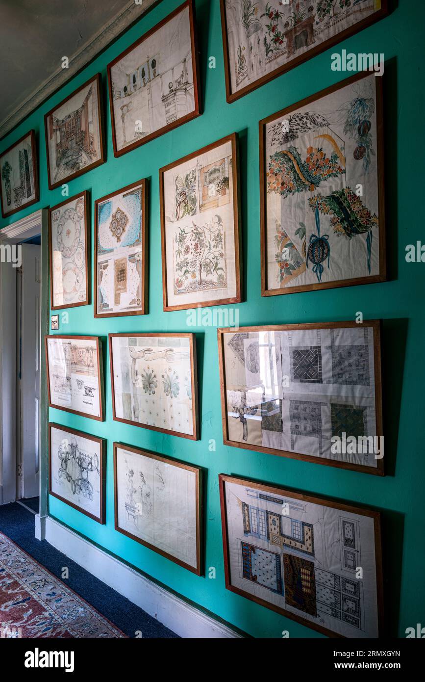 PIcture wall in 18th century flower loft conversion near Penzance in Cornwall, UK Stock Photo