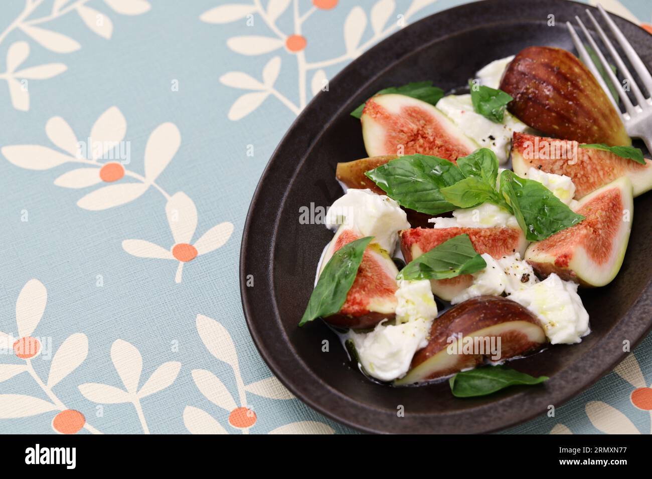 fig caprese salad(fig, mozzarella and basil) Stock Photo