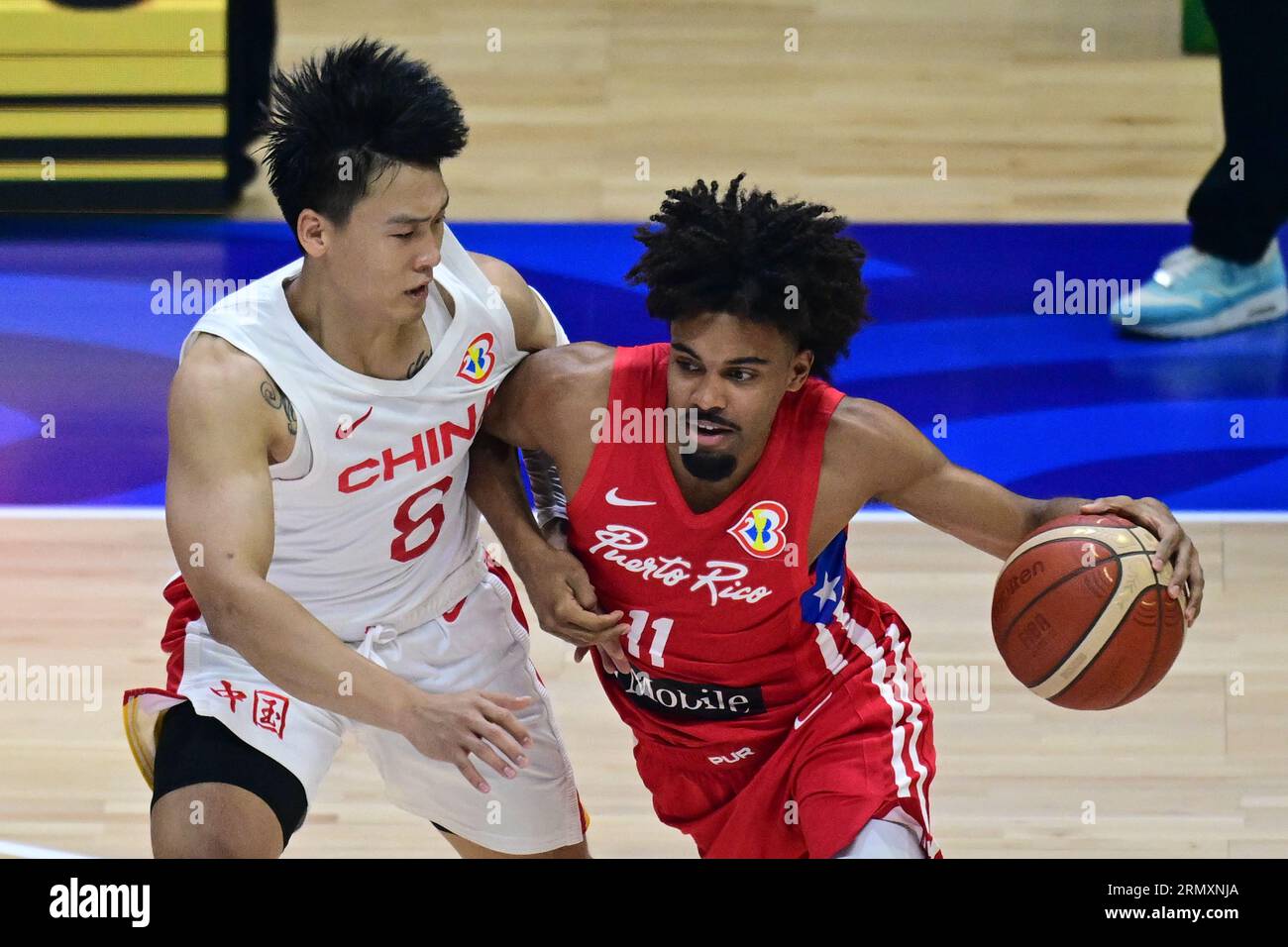 Quezon City, Philippines. 30th Aug, 2023. Rui Zhao (L) of China men ...