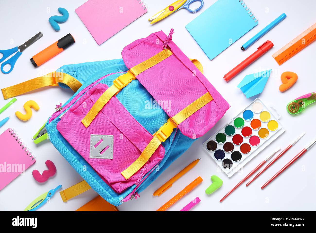 Stylish school backpack and different stationery on white background Stock Photo