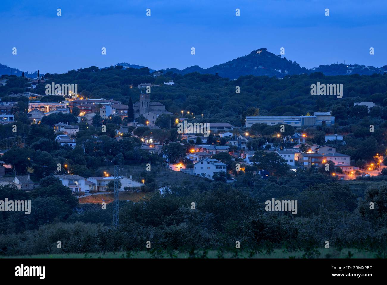 Village of Santa Eulàlia de Ronçana at dusk (Vallès Oriental, Barcelona, Catalonia, Spain) ESP: Pueblo de Santa Eulàlia de Ronçana al anochecer España Stock Photo