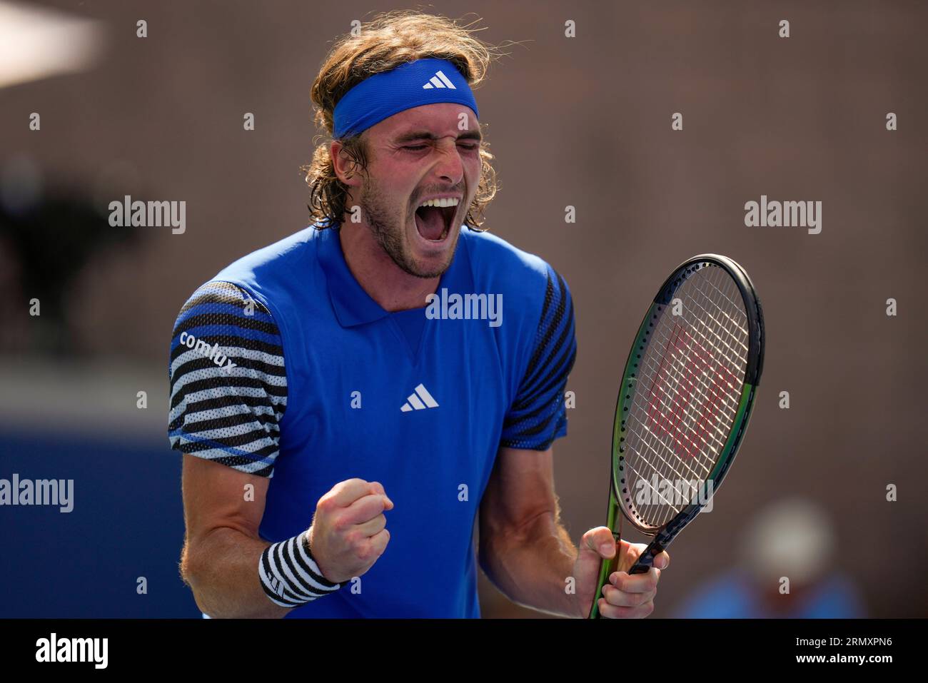 CAPTION CORRECTION CORRECTS MATCH RESULTS Stefanos Tsitsipas, of Greece, reacts during a Dominic Stricker, of Switzerland, during the second round of the U.S