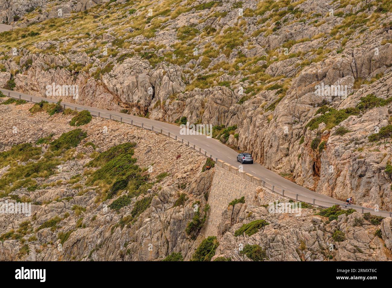 Road between rocks to the Cap de Formentor cape (Majorca, Balearic Islands, Spain) ESP: Carretera entre rocas al cabo de Formentor, Mallorca, Baleares Stock Photo
