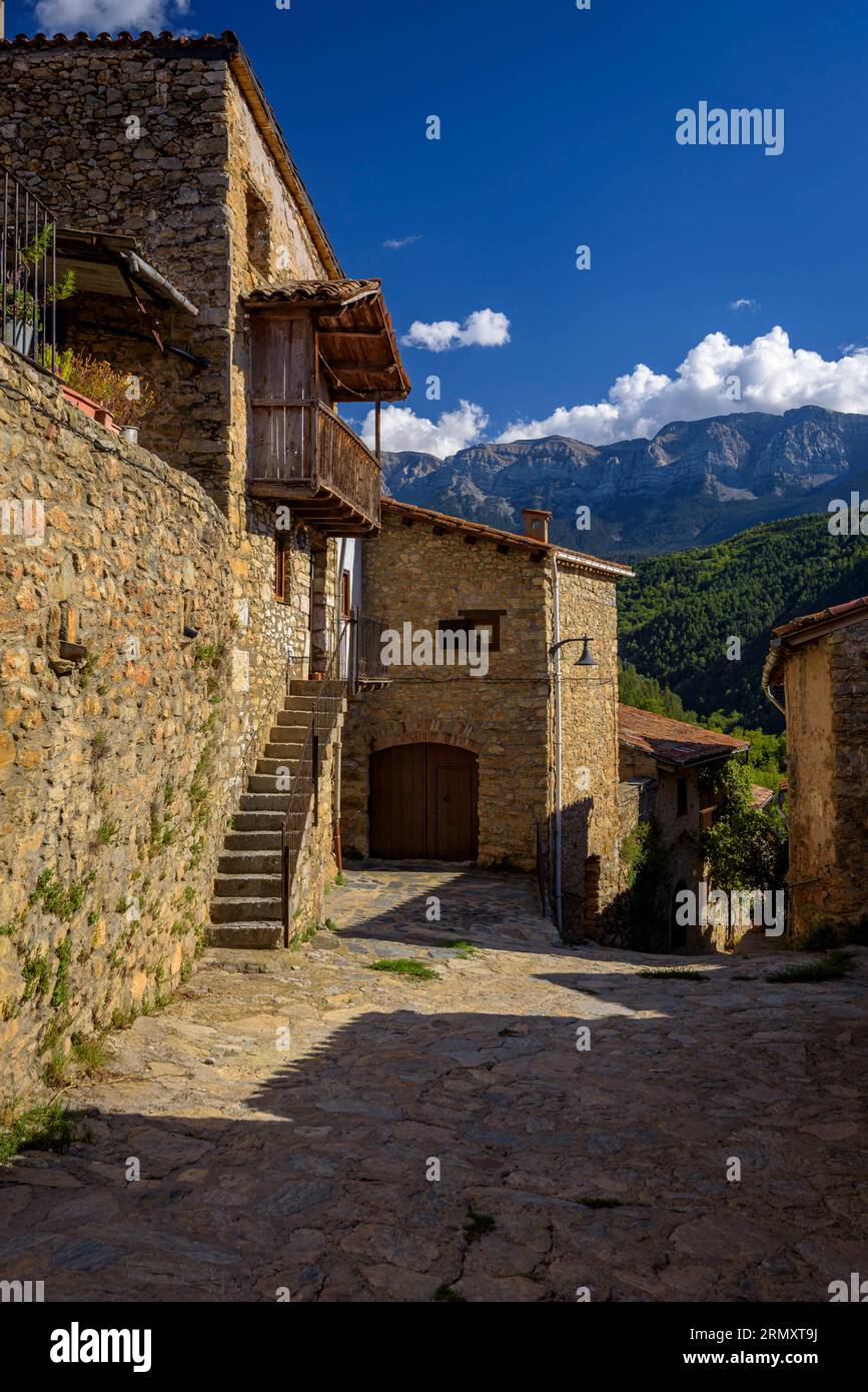 Rustic houses and cobbled streets of the small rural town of Arsèguel ...