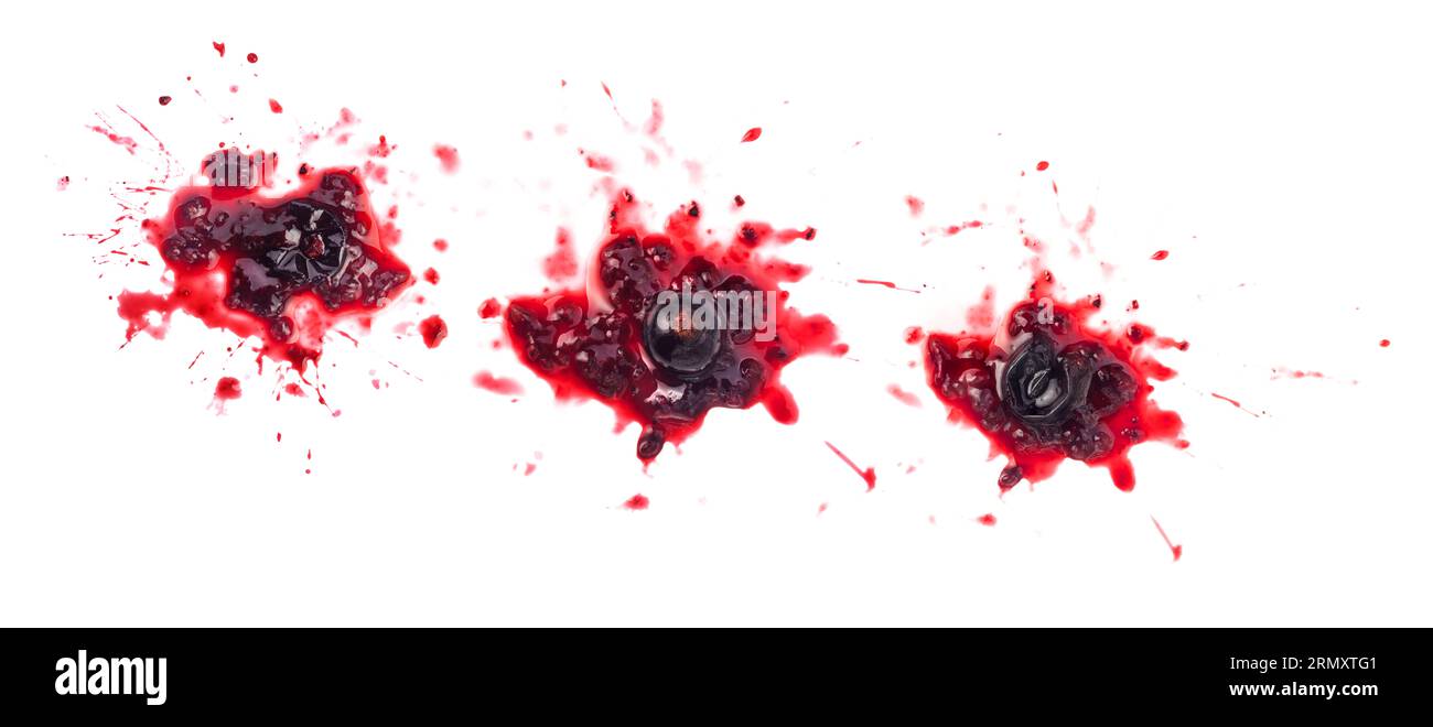 Smashed black currant berries isolated on white background Stock Photo
