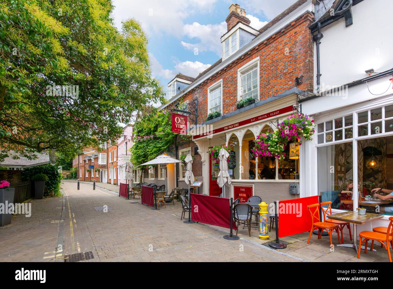General view of the 18th century Inn and pub The Old Vine, across from the Winchester Cathedral in the town of Winchester, England, United Kingdom. Stock Photo