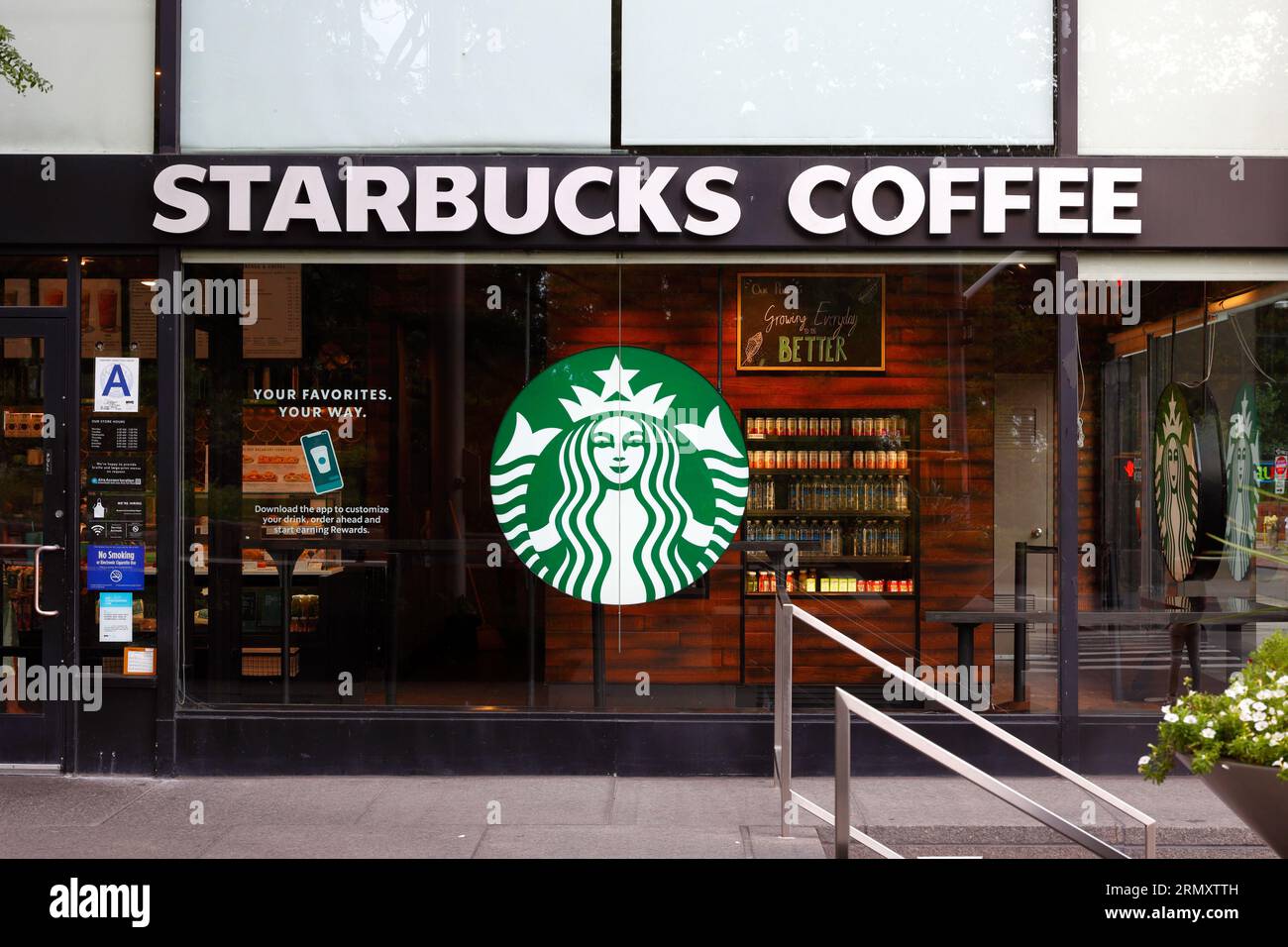 Starbucks Coffee, 1 Battery Park Plaza, New York, NYC storefront photo of a coffee shop chain in Downtown Manhattan. Stock Photo