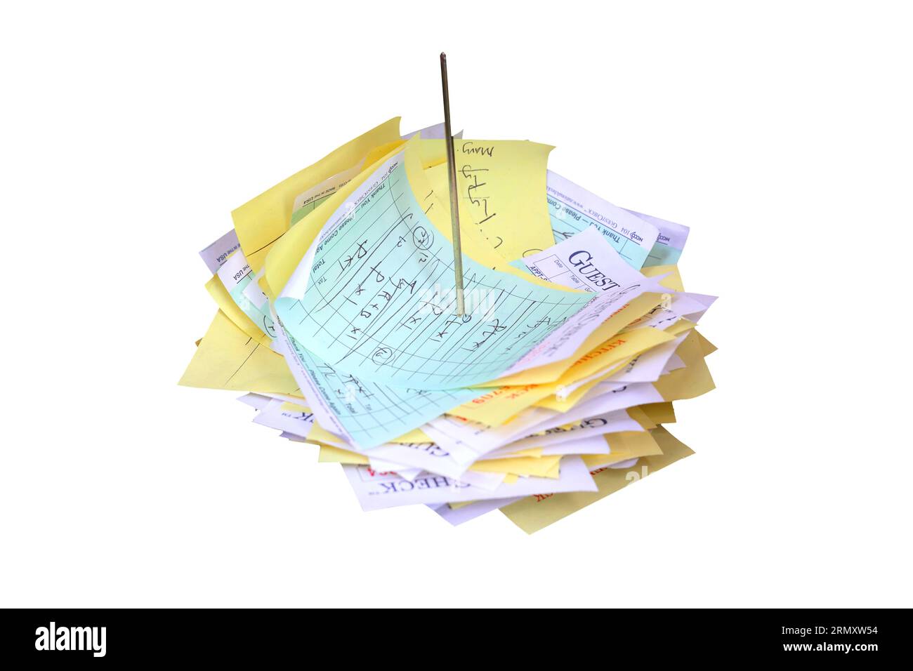 A straight rod, spiked memo holder holding food orders and receipts isolated on a white background. Stock Photo
