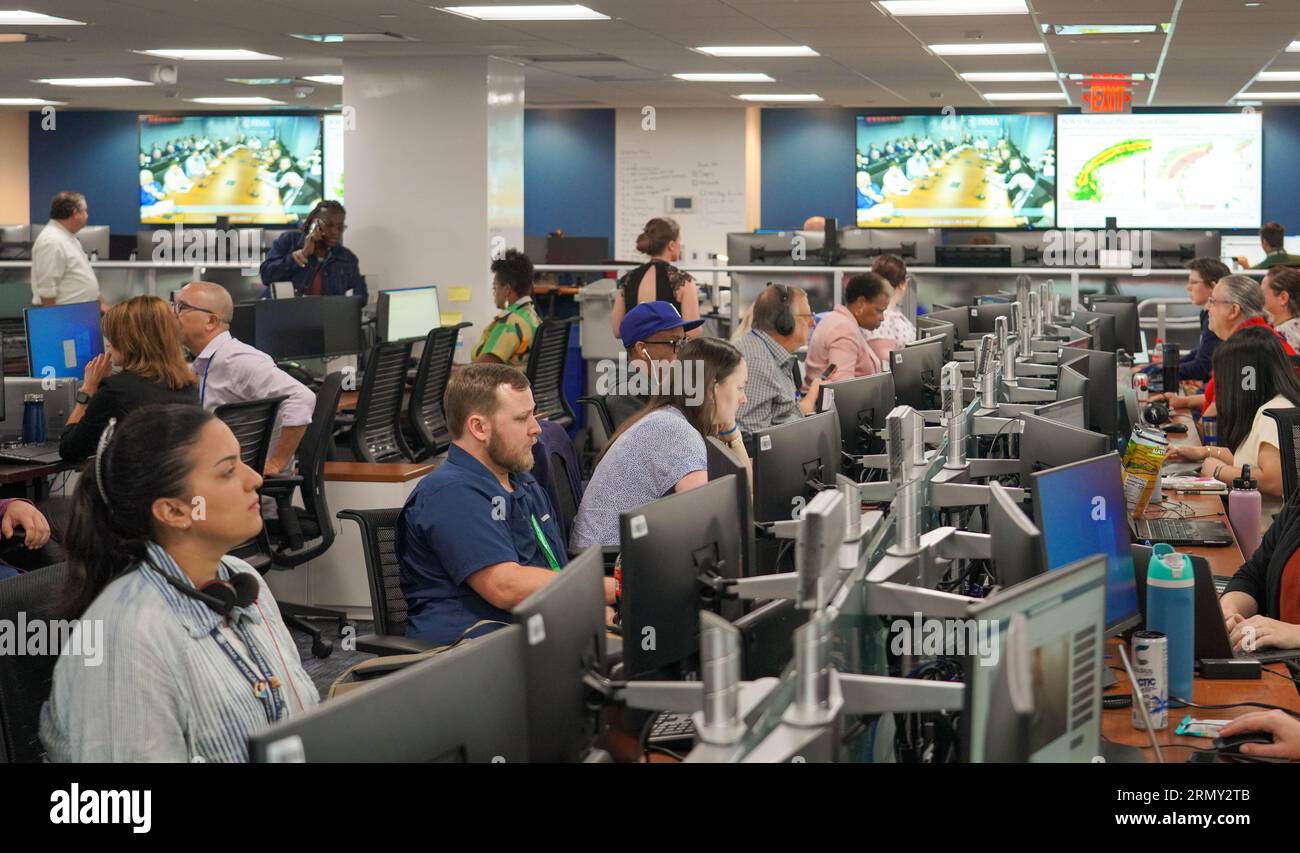 Washington, United States. 30th Aug, 2023. Federal Emergency Management Agency personnel monitor the situation with Hurricane Idalia from the command center at FEMA Headquarters, August 30, 2023 in Washington, DC Credit: Jenna Converse/FEMA/Alamy Live News Stock Photo