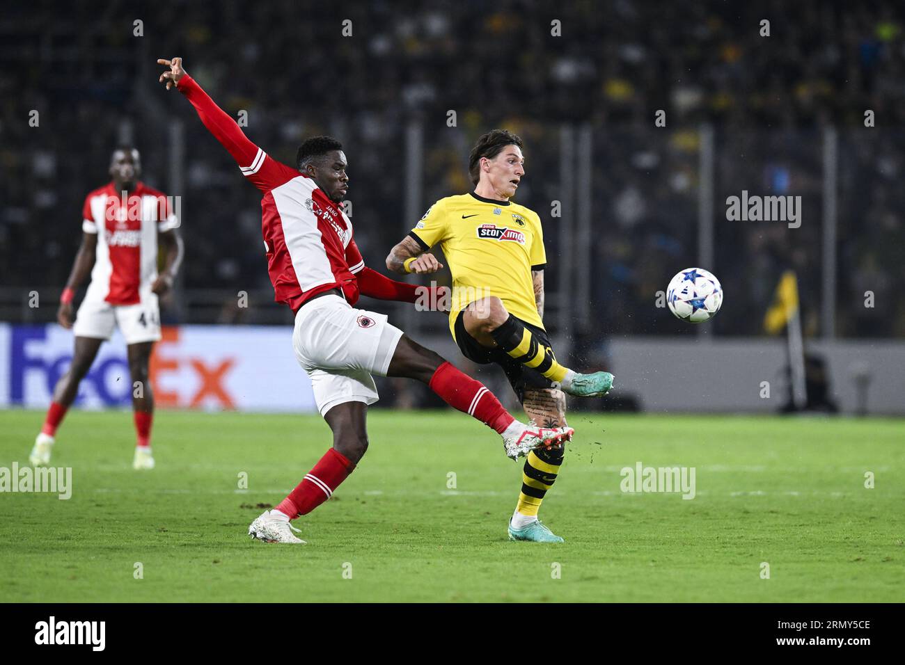 Athens, Greece. 30th Aug, 2023. Antwerp's Mandela Keita and Athens' Steven Zuber pictured in action during a soccer game between Greek AEK Athens FC and Belgian soccer team Royal Antwerp FC, Wednesday 30 August 2023 in Athens, Greece, the return leg of the play-offs for the UEFA Champions League competition. BELGA PHOTO TOM GOYVAERTS Credit: Belga News Agency/Alamy Live News Stock Photo