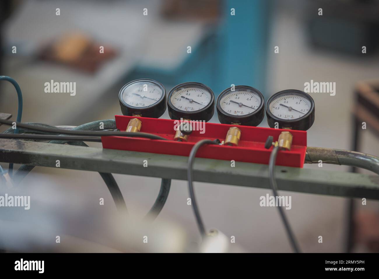 Manometer for setting carburetor, four vacuum gauges for precision setting of vintage carburetor engines to perform their best under all circumstances Stock Photo