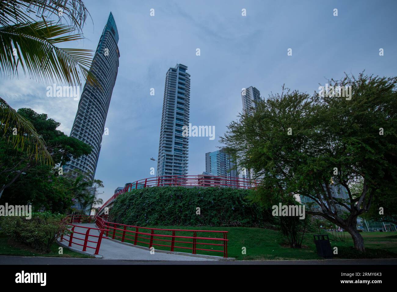 Pedestrian overpass with red railing in panama city, over the motorway ...